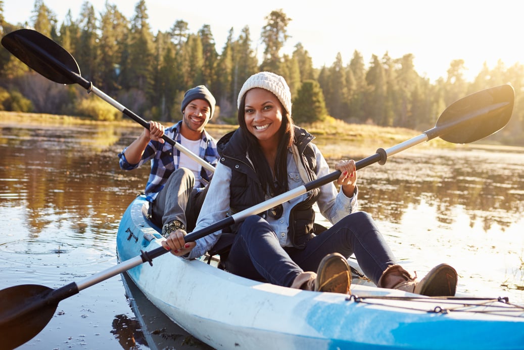 African American Couple Rowing  