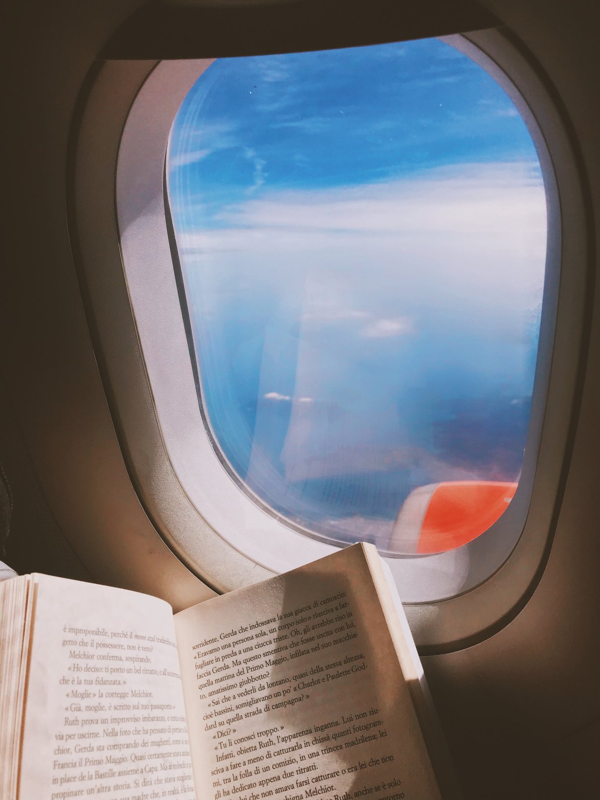 Person Sitting By The Window 